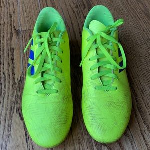Neon yellow Adidas soccer cleats